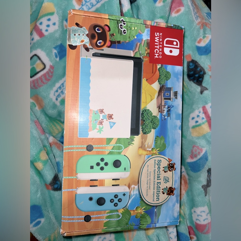 Lightly used NINTENDO SWITCH: ANIMAL CROSSING EDITION IN BOX WITH GAME!!